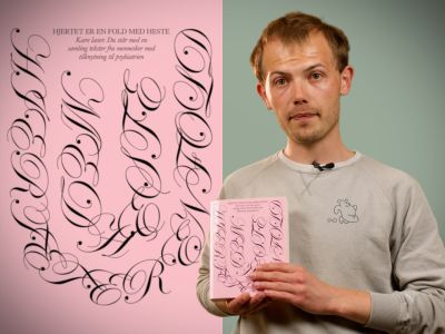 Bibliotekets litteraturformidler Stinus holder bogen "Hjertet er en fold med heste"