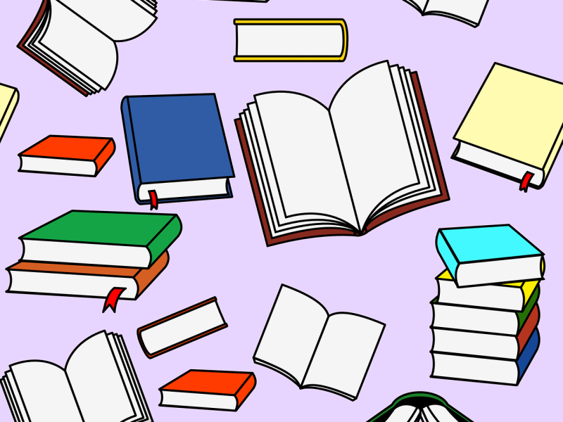 Bøger der er opslået og lukket på en blå baggrund