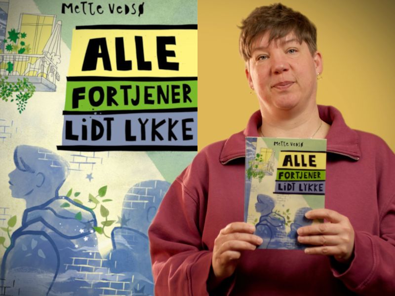 Bibliotekets børnelitteraturformidler Louise holder bogen "Alle fortjener lidt lykke"